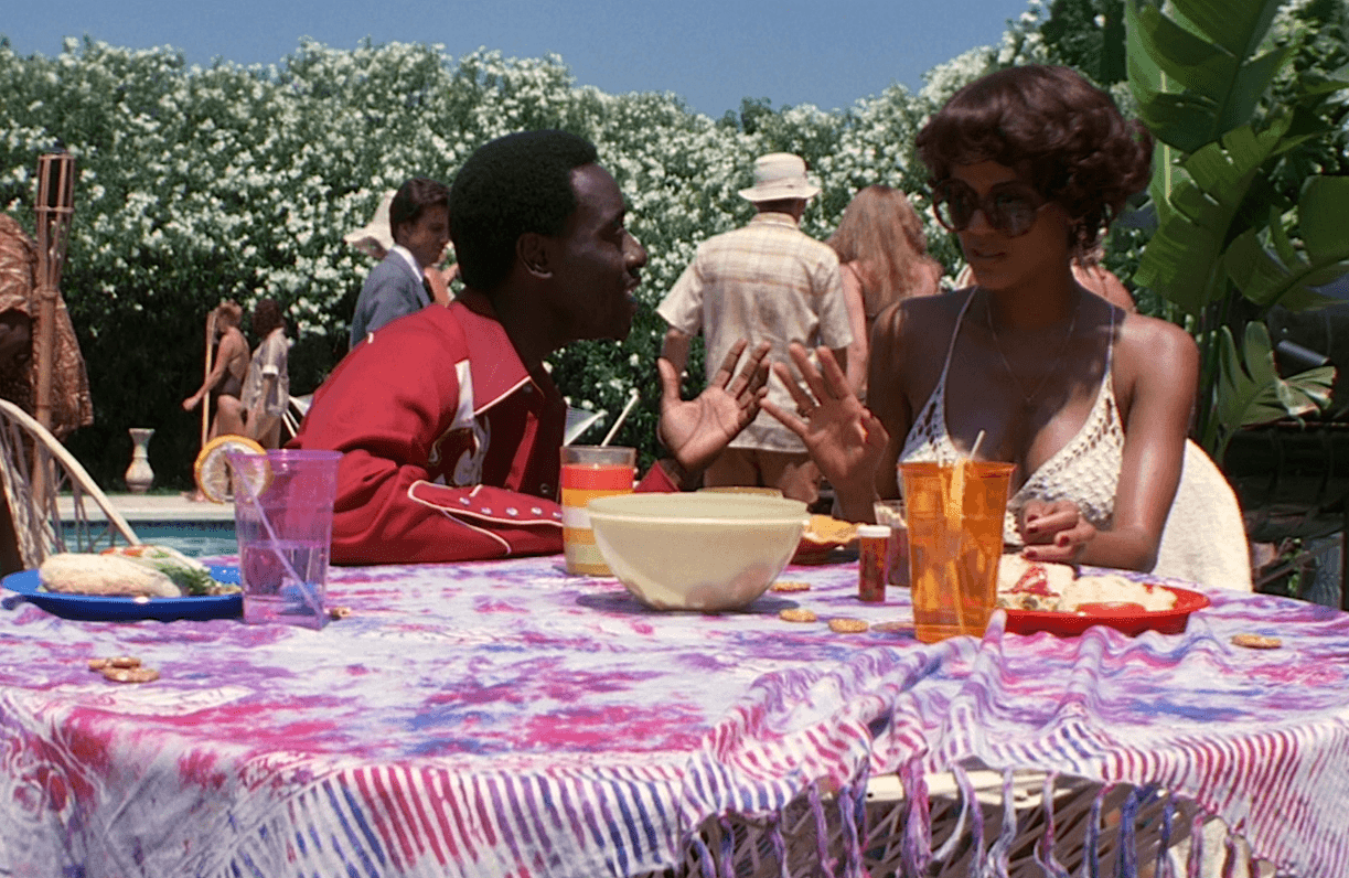 Don Cheadle y Nicole Ari Parker en Boogie Nights